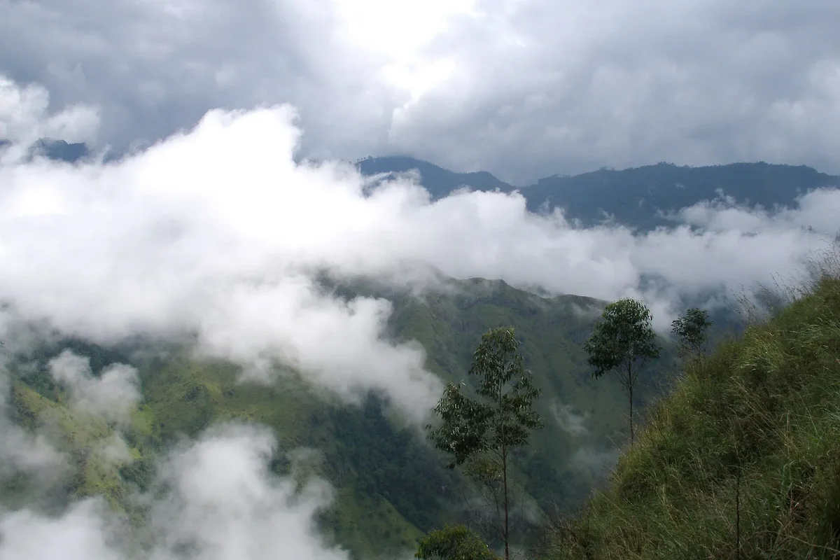 Highland slopes wrapped in clouds near Ella, Sri Lanka