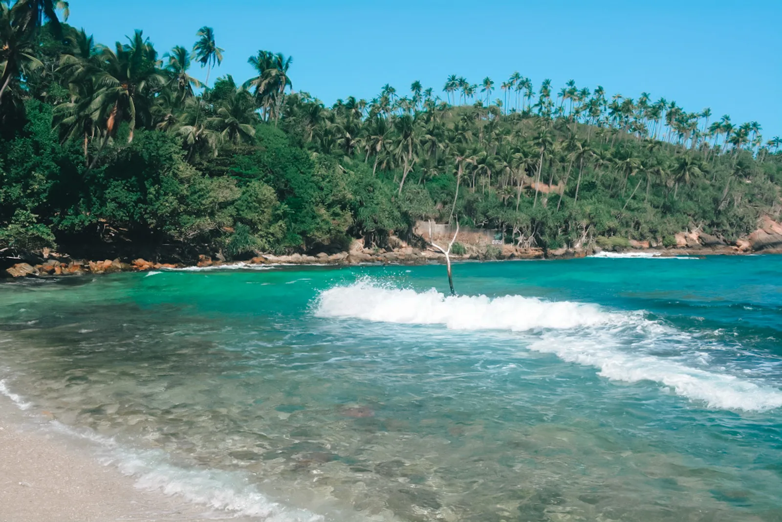 Secluded sandy cove near Mirissa on Sri Lanka's southern coast
